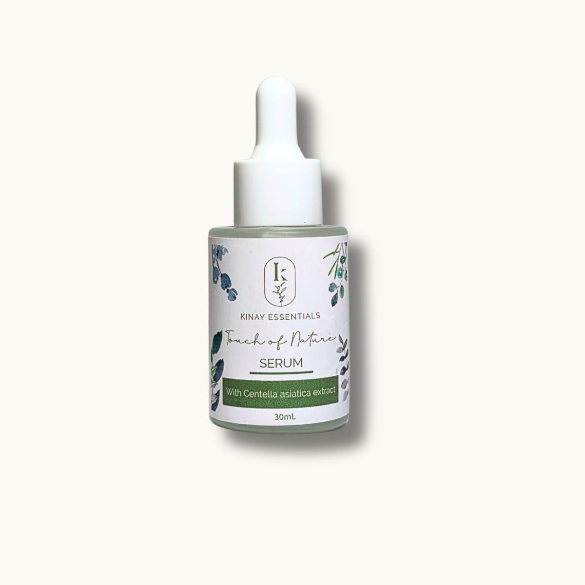 Serum bottle with dropper labeled 'Touch of Nature' on a white background